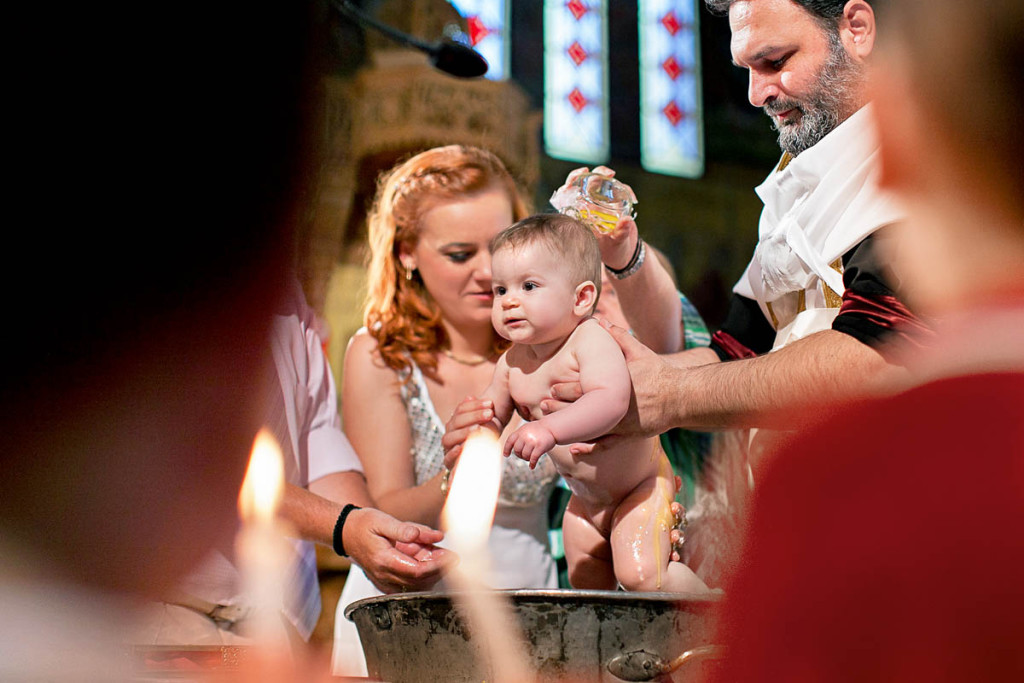 Care este rolul lumanarilor la botezul copilului?